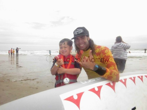 B with CJ, his surfer, doing the shaka. 